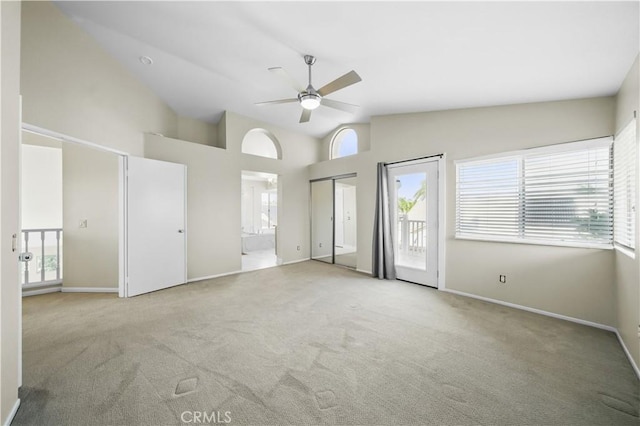 31070 Larchwood St, Menifee, CA 92584 - unfurnished bedroom featuring multiple windows, access to outside, carpet floors, and high vaulted ceiling