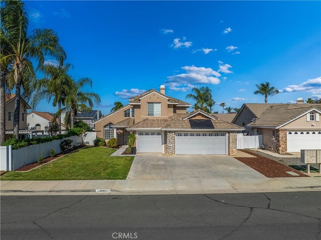31070 Larchwood St, Menifee, CA 92584 - view of front of house featuring roof mounted solar panels, driveway, stone siding, an attached garage, and stucco siding