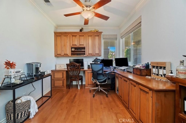 23328 Stone Rdg, Murrieta, CA 92562 - home office with crown molding, a ceiling fan, light wood-type flooring, and built in desk