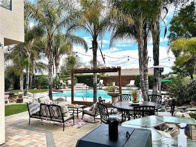 23328 Stone Rdg, Murrieta, CA 92562 - view of patio / terrace with a pergola, a community pool, and an outdoor hangout area