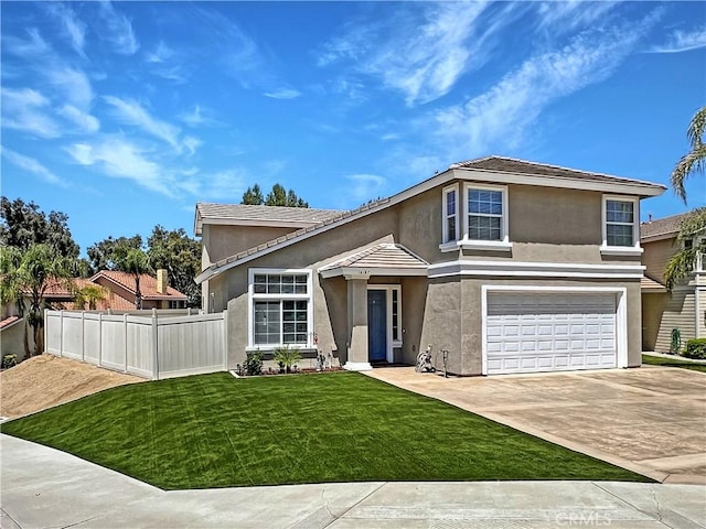 16187 Cousins Cir, Riverside, CA 92503 - traditional-style house featuring stucco siding, an attached garage, and driveway