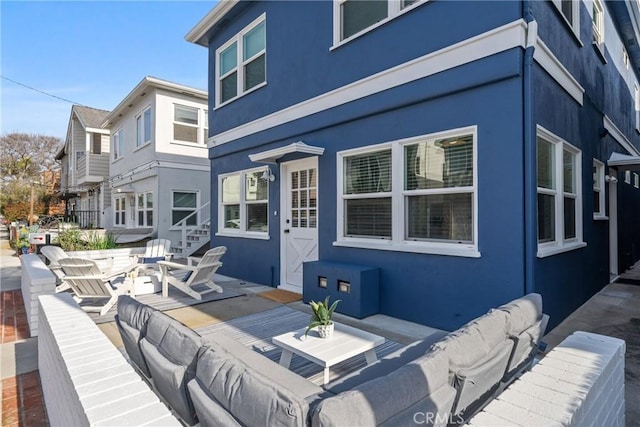 502 36th St, Newport Beach, CA 92663 - rear view of property featuring stucco siding and an outdoor living space