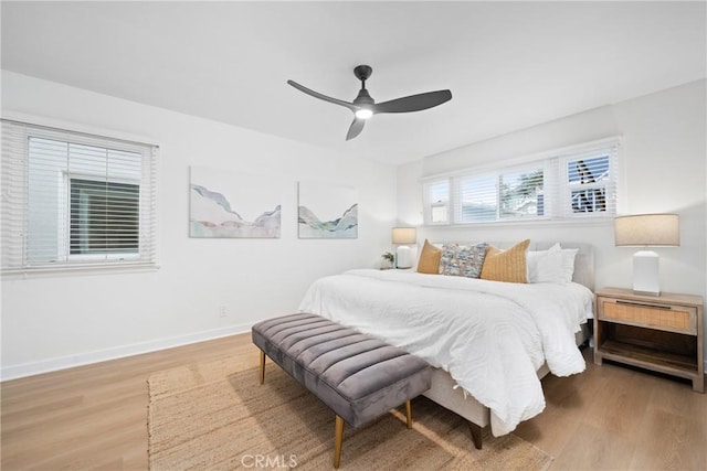 502 36th St, Newport Beach, CA 92663 - bedroom with wood finished floors, baseboards, and ceiling fan
