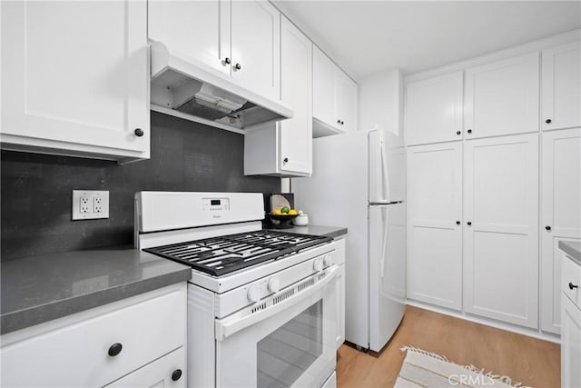 502 36th St, Newport Beach, CA 92663 - kitchen with white appliances, under cabinet range hood, light wood-style floors, and white cabinets