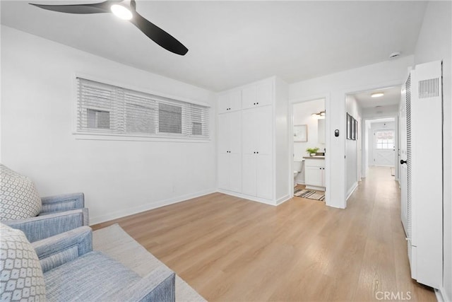 502 36th St, Newport Beach, CA 92663 - sitting room featuring a heating unit, a ceiling fan, light wood-style floors, and baseboards