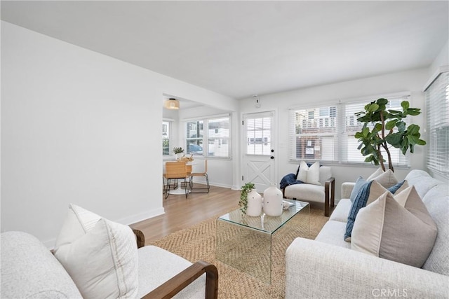 502 36th St, Newport Beach, CA 92663 - living room with plenty of natural light, wood finished floors, and baseboards