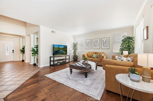24320 Calle Estancia, Murrieta, CA 92562 - living area with plenty of natural light, crown molding, and wood finished floors