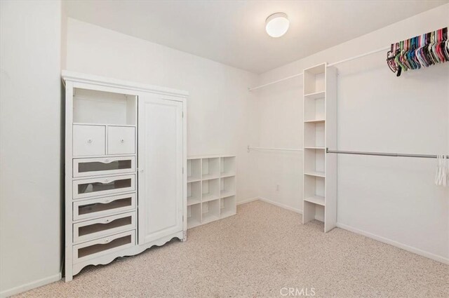 24320 Calle Estancia, Murrieta, CA 92562 - walk in closet featuring carpet floors
