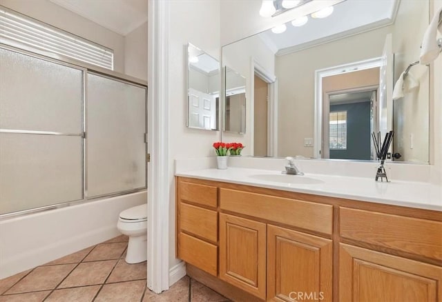 24320 Calle Estancia, Murrieta, CA 92562 - bathroom with crown molding, vanity, tile patterned flooring, and bath / shower combo with glass door