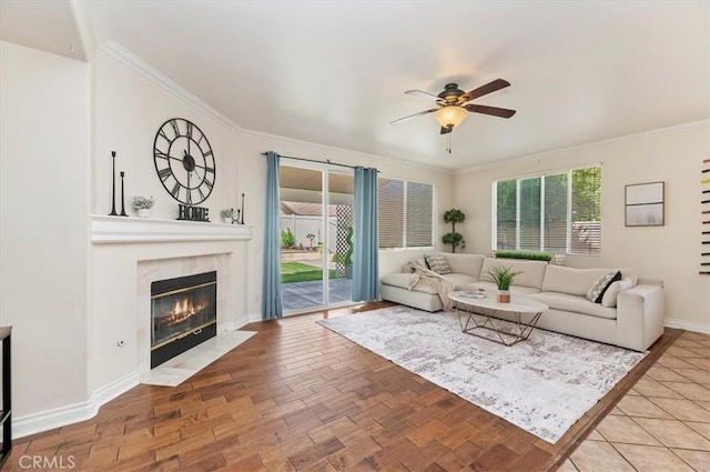 24320 Calle Estancia, Murrieta, CA 92562 - living area featuring ceiling fan, a high end fireplace, crown molding, and wood finished floors