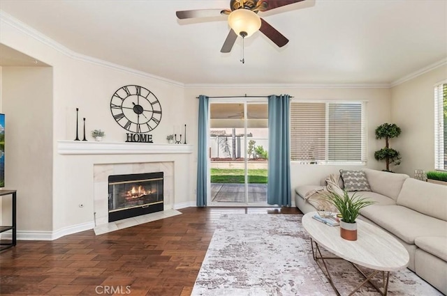24320 Calle Estancia, Murrieta, CA 92562 - living area with ornamental molding, wood finished floors, a ceiling fan, and a premium fireplace