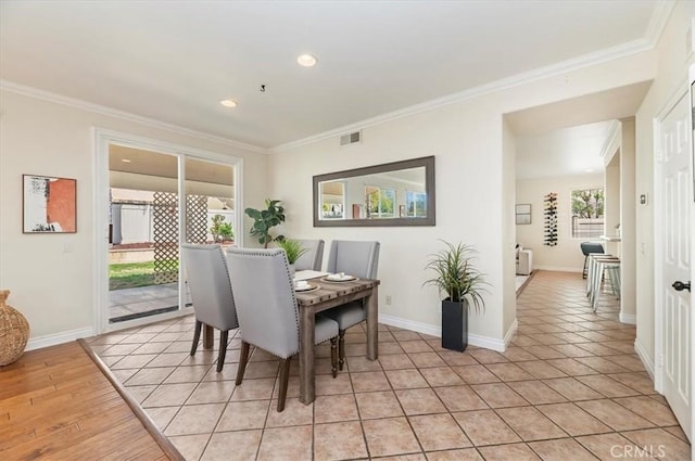 24320 Calle Estancia, Murrieta, CA 92562 - dining area featuring ornamental molding, recessed lighting, and light tile patterned floors