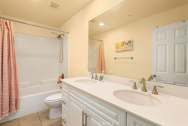 706 Leather Oak Ln, Pomona, CA 91766 - bathroom featuring toilet, double vanity, shower / bath combo, and tile patterned floors
