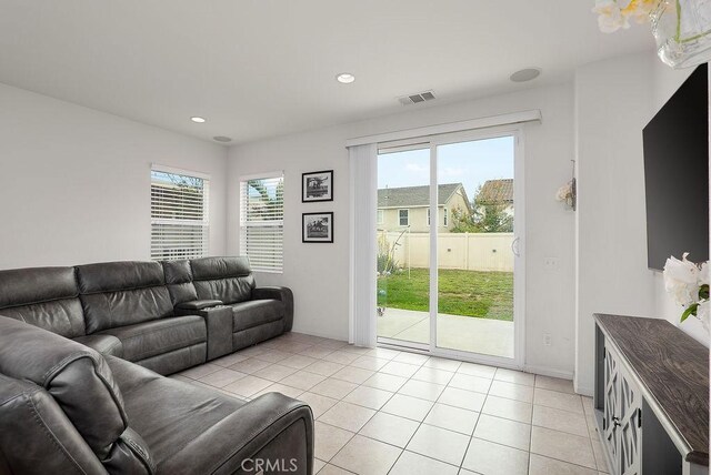 706 Leather Oak Ln, Pomona, CA 91766 - living room featuring light tile patterned floors and recessed lighting