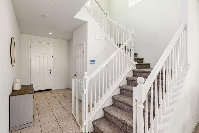 706 Leather Oak Ln, Pomona, CA 91766 - foyer featuring stairway, light tile patterned floors, and recessed lighting