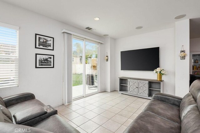 706 Leather Oak Ln, Pomona, CA 91766 - living area featuring light tile patterned floors and baseboards