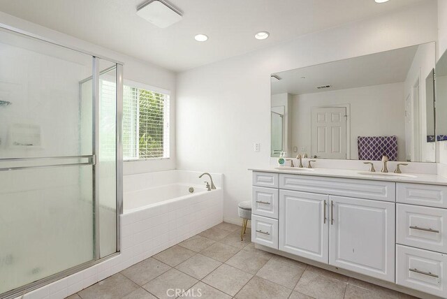 706 Leather Oak Ln, Pomona, CA 91766 - full bath featuring double vanity, a garden tub, a stall shower, tile patterned floors, and recessed lighting