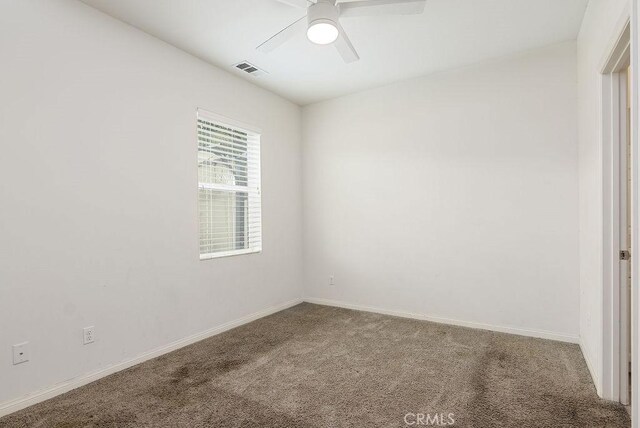 706 Leather Oak Ln, Pomona, CA 91766 - carpeted empty room with a ceiling fan and baseboards