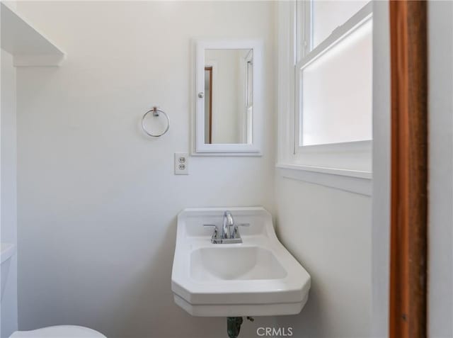 404 N Pear Knl, Anaheim, CA 92805 - bathroom with healthy amount of natural light, toilet, and a sink