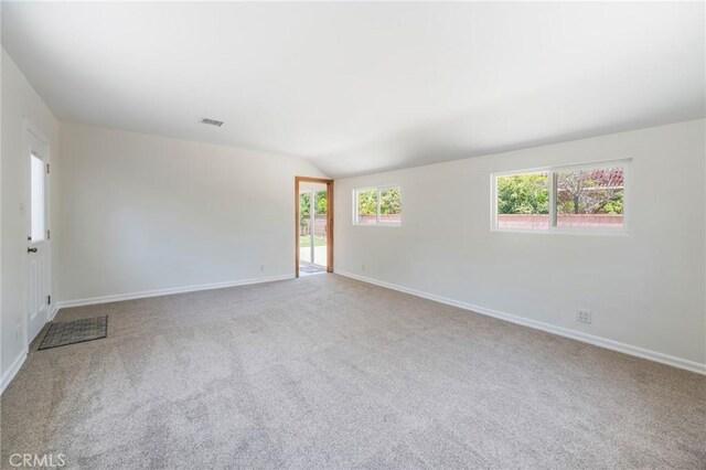 404 N Pear Knl, Anaheim, CA 92805 - carpeted spare room featuring baseboards and vaulted ceiling