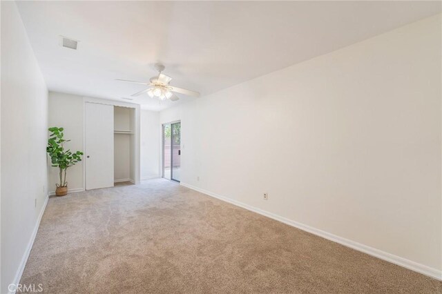 404 N Pear Knl, Anaheim, CA 92805 - unfurnished bedroom with light carpet, baseboards, a closet, and a ceiling fan