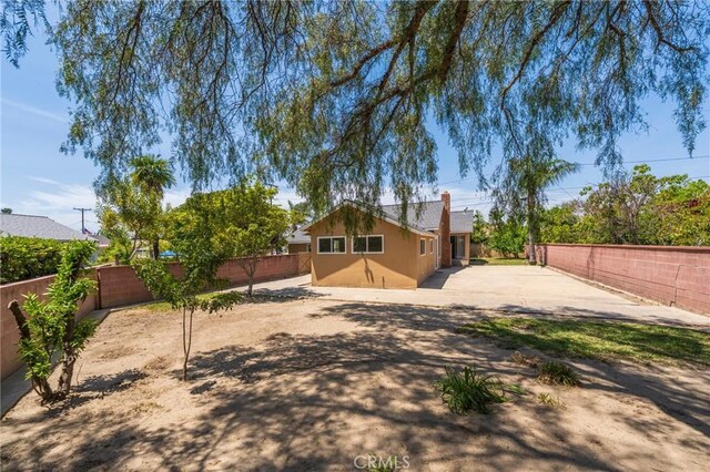 404 N Pear Knl, Anaheim, CA 92805 - rear view of house featuring a fenced backyard