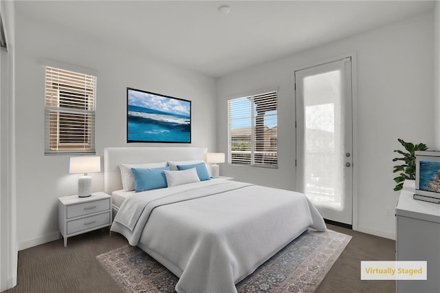 15814 Moonflower Ave, Chino, CA 91708 - bedroom featuring access to outside, baseboards, and dark carpet