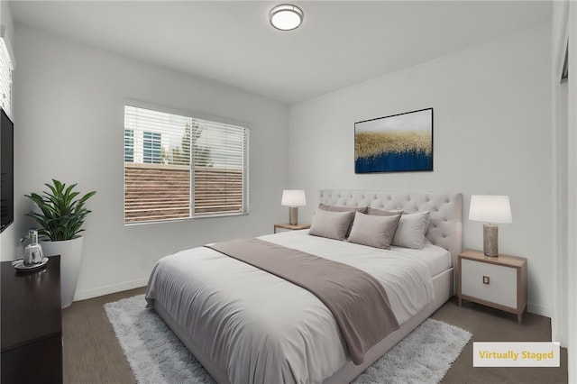 15814 Moonflower Ave, Chino, CA 91708 - bedroom with baseboards and wood finished floors