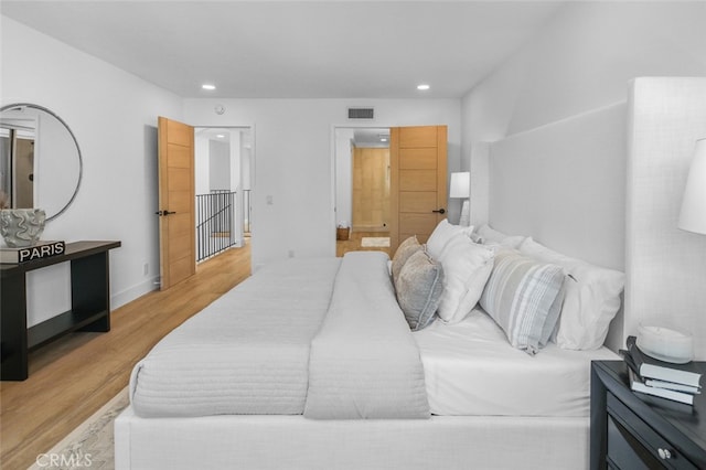 22526 Lake Forest Ln, Lake Forest, CA 92630 - bedroom featuring light wood-type flooring and recessed lighting