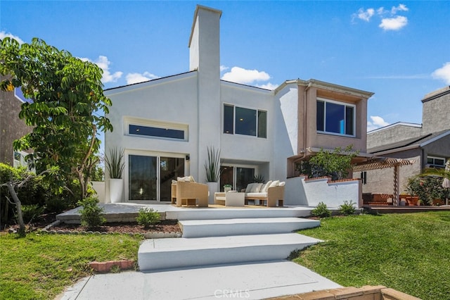 22526 Lake Forest Ln, Lake Forest, CA 92630 - back of property with outdoor lounge area, stucco siding, a yard, and a patio