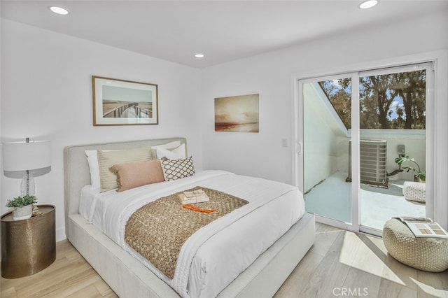 22526 Lake Forest Ln, Lake Forest, CA 92630 - bedroom with wood finished floors, access to exterior, and recessed lighting