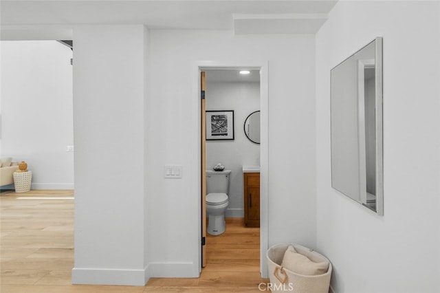 22526 Lake Forest Ln, Lake Forest, CA 92630 - corridor featuring wood finished floors and baseboards