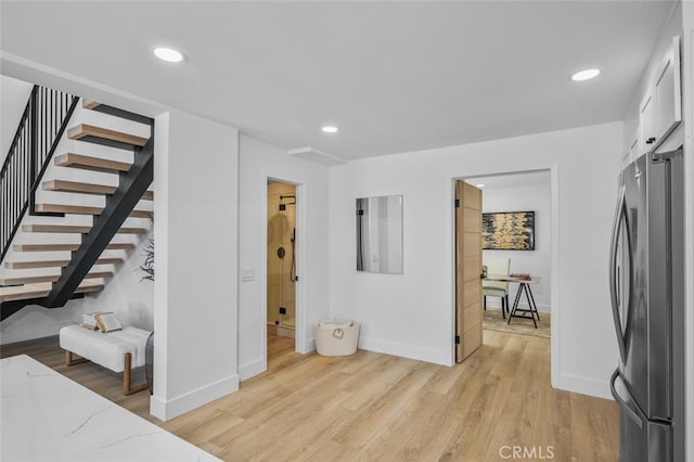 22526 Lake Forest Ln, Lake Forest, CA 92630 - bedroom with freestanding refrigerator, light wood finished floors, and recessed lighting