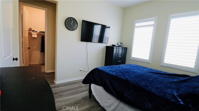 27506 Aster Way, Saugus, CA 91350 - bedroom featuring wood finished floors, baseboards, and a spacious closet
