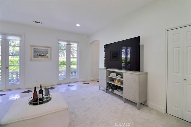 8424 Sunnyslope Dr, San Gabriel, CA 91775 - living area featuring french doors, arched walkways, healthy amount of natural light, baseboards, and recessed lighting