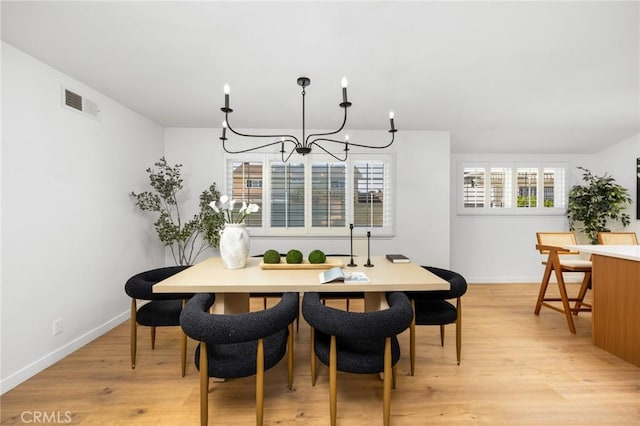 230 Gila Way, Placentia, CA 92870 - dining area with a chandelier, light wood-type flooring, and baseboards