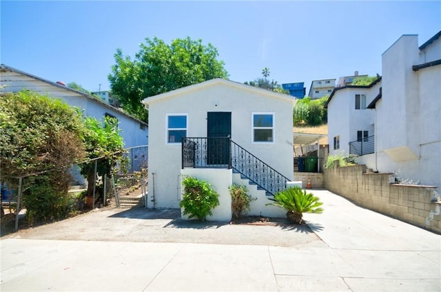 2028 N Marianna Ave, Los Angeles, CA 90032 - view of front of property featuring stairs, stucco siding, and a gate