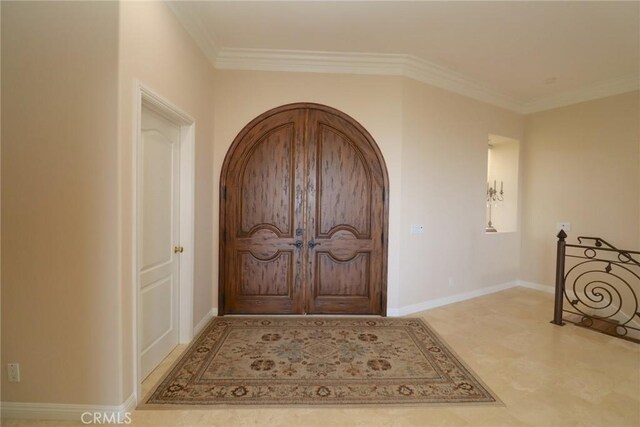 485 Kathleen Dr, Newbury Park, CA 91320 - entryway featuring ornamental molding, arched walkways, and baseboards