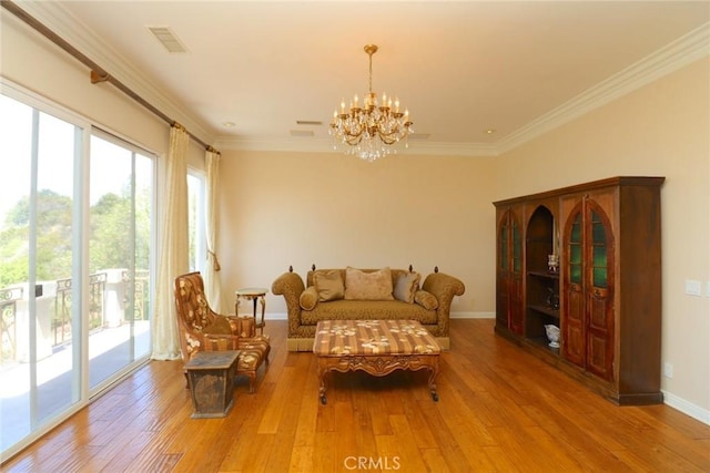 485 Kathleen Dr, Newbury Park, CA 91320 - living area featuring a chandelier, healthy amount of natural light, hardwood / wood-style floors, baseboards, and ornamental molding