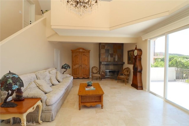 485 Kathleen Dr, Newbury Park, CA 91320 - living area with a large fireplace, a chandelier, and crown molding