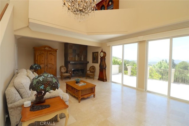 485 Kathleen Dr, Newbury Park, CA 91320 - living room with a fireplace, a chandelier, and ornamental molding