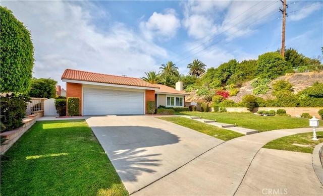2501 Tiffany Pl, Fullerton, CA 92833 - view of front of property with driveway, a front lawn, a garage, a tile roof, and a chimney