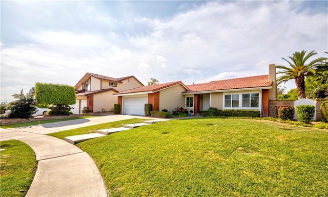 2501 Tiffany Pl, Fullerton, CA 92833 - view of front facade with a garage, driveway, and a tile roof