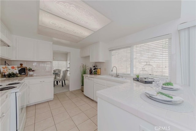 2501 Tiffany Pl, Fullerton, CA 92833 - kitchen with white appliances, tile counters, a sink, and white cabinetry