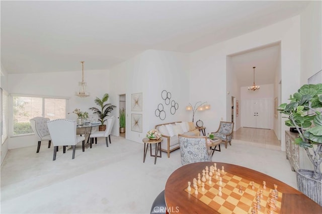 2501 Tiffany Pl, Fullerton, CA 92833 - carpeted living area featuring a chandelier and lofted ceiling