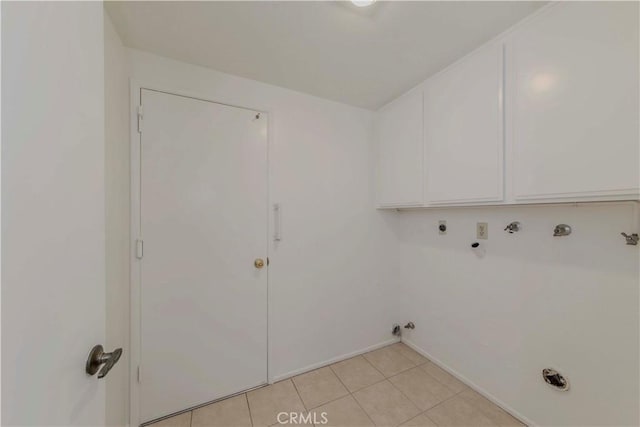 2501 Tiffany Pl, Fullerton, CA 92833 - washroom with cabinet space, gas dryer hookup, light tile patterned flooring, hookup for a washing machine, and baseboards