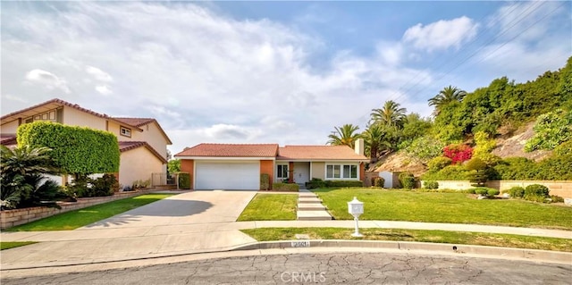 2501 Tiffany Pl, Fullerton, CA 92833 - view of front of property with a garage, driveway, a front yard, and stucco siding