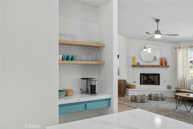 49239 Barrymore St, Indio, CA 92201 - living room featuring a fireplace with raised hearth