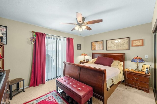 27525 Ventura Dr, Cathedral City, CA 92234 - bedroom with light carpet, a ceiling fan, and access to exterior