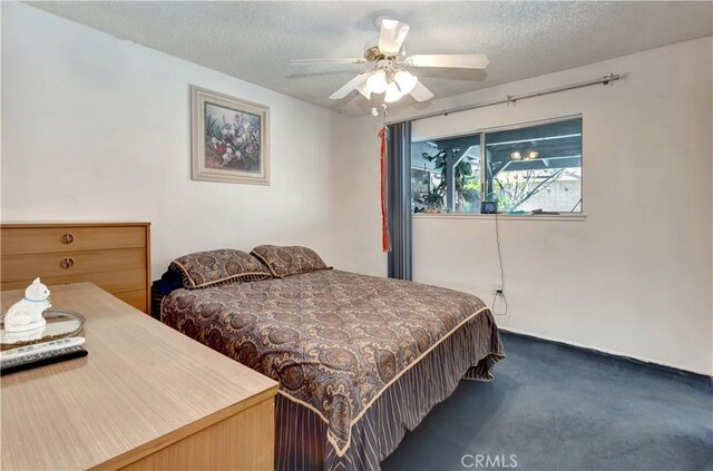 24812 Calle El Toro Grande, Lake Forest, CA 92630 - bedroom featuring carpet floors, a textured ceiling, and a ceiling fan
